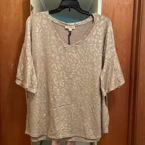 Jane and Delancey Tan and Gold Top